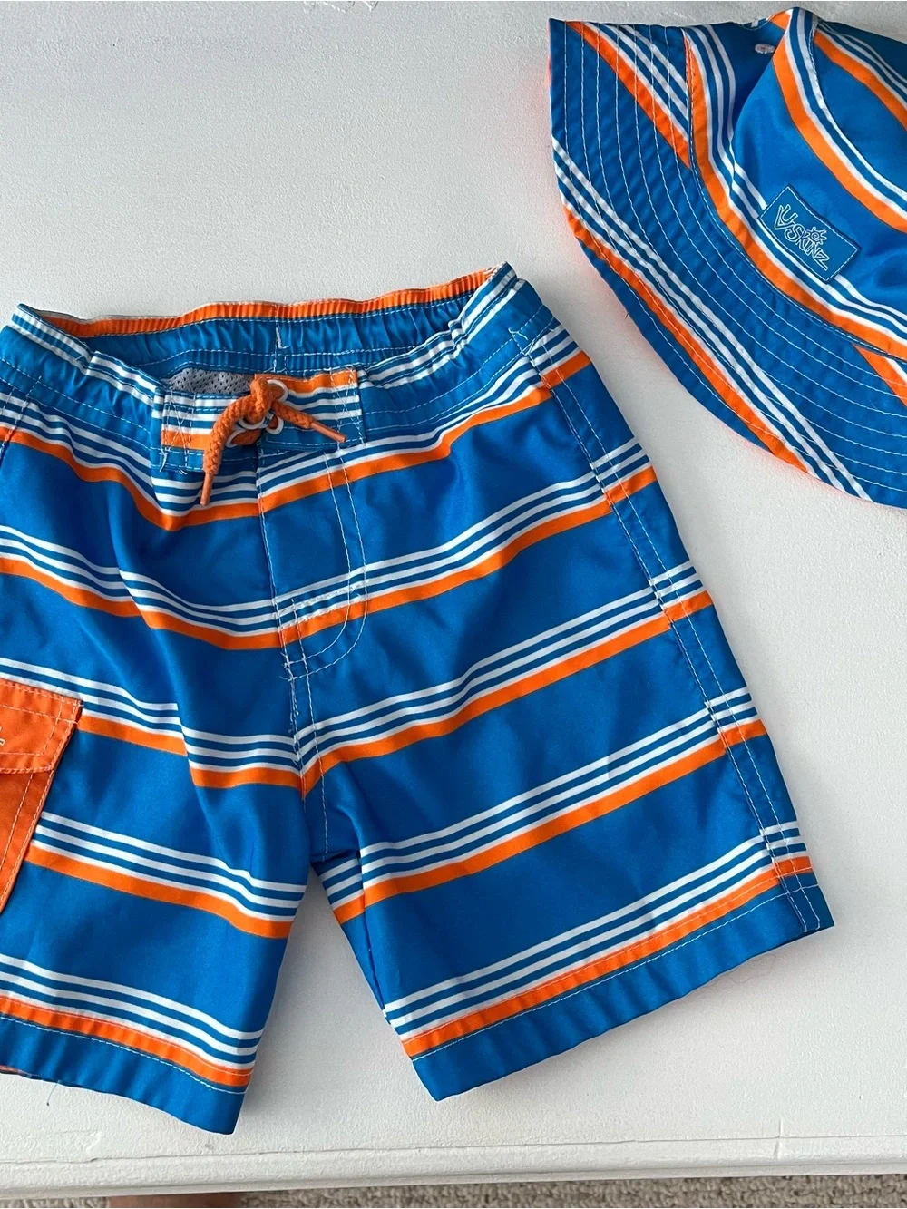 UV Skinz Swim Set size 3T (? ) Board Shorts & Hat Orange/blue/white  Striped.